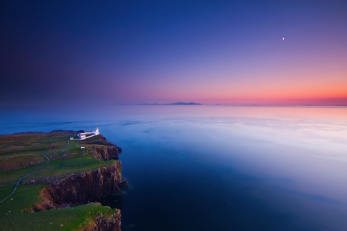 blue ocean sunset-evening-sky-moon-beach-cliff-lighthouse-nature globeattractions.com -